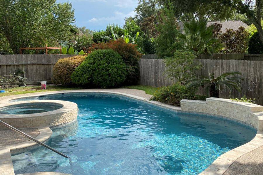 Pool Service in Katy 5 Image of a clean swimming pool with pool service in Katy